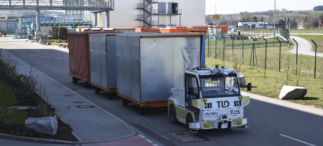 The EZTow autonomous tow tractor at the BMW Group Plant Dingolfing in Germany,  Image: TractEasy Inc.