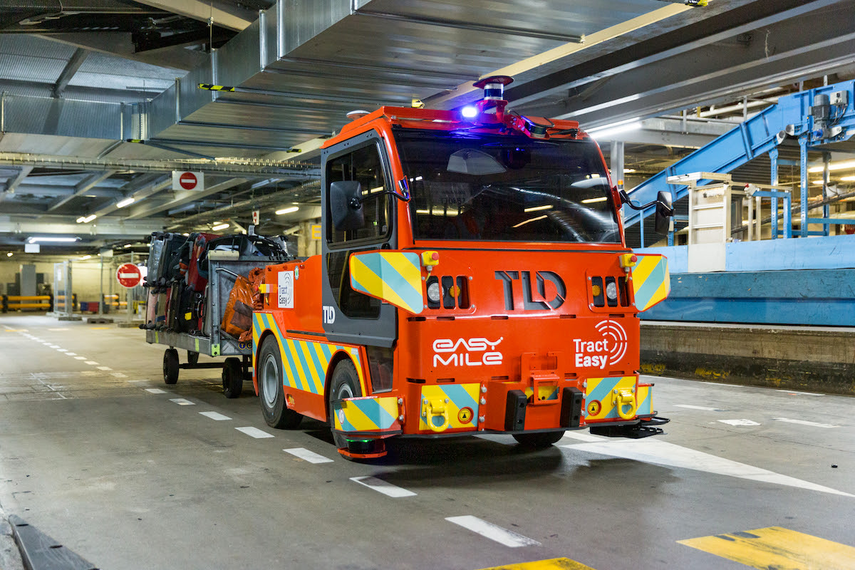 Driverless baggage tractor at airport